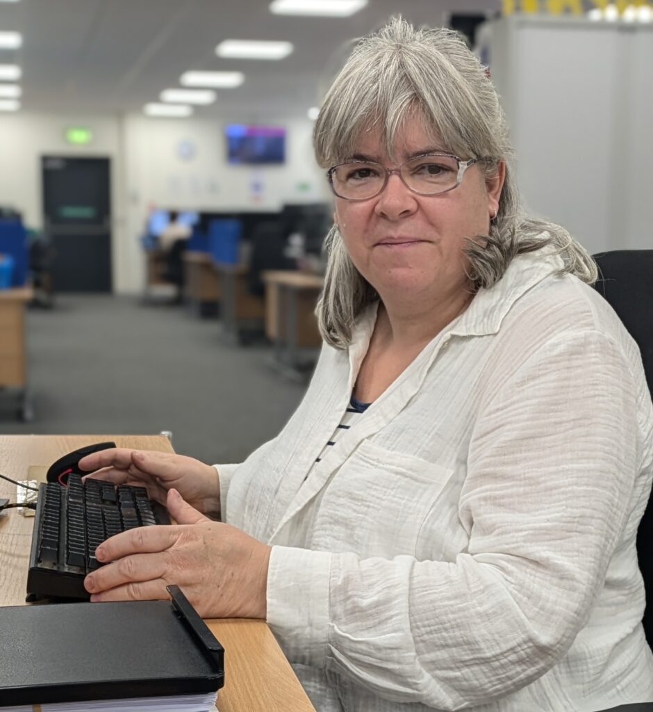 Tracey works at her desk at Family Fund HQ