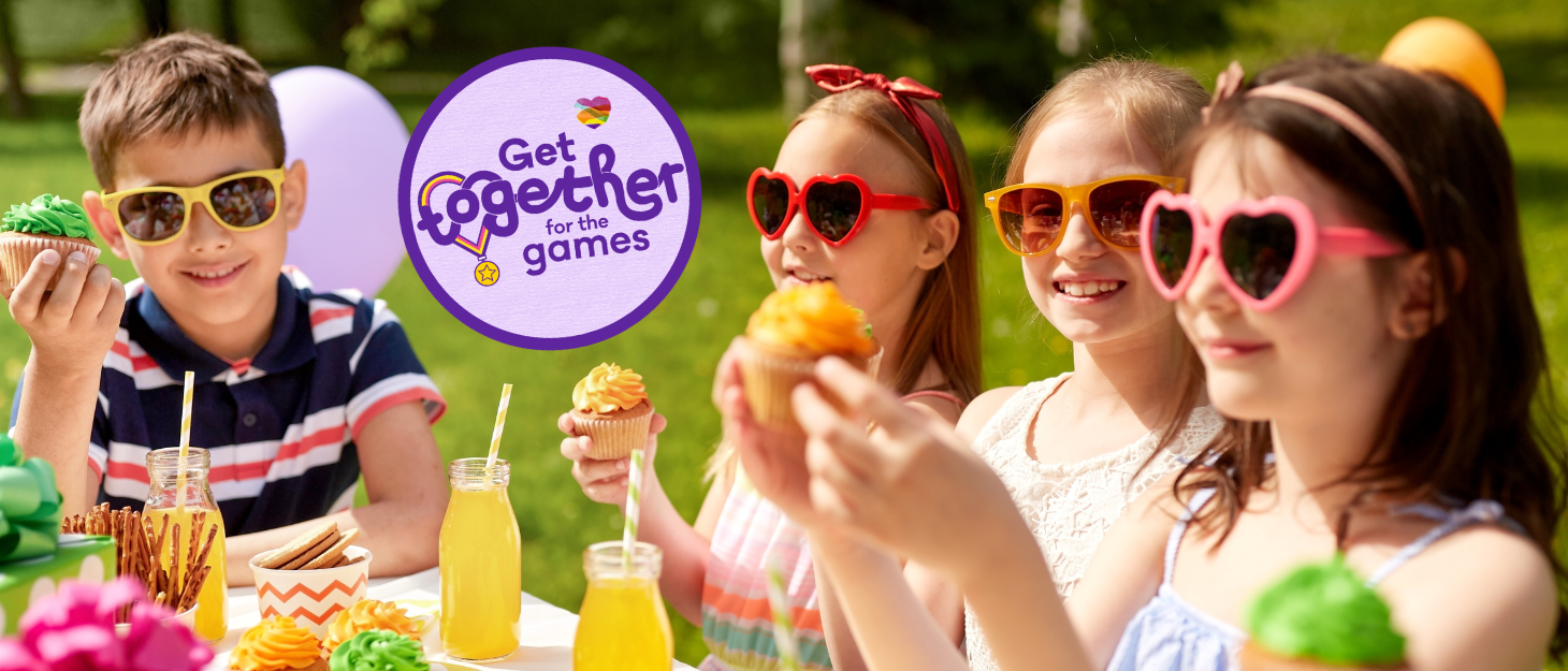 Four children wearing sunglasses sit at a table eating cake in the sunshine. The Family Fund Get together for the games logo is shown in the left of the image.